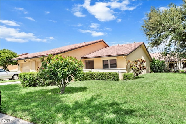 view of front of house with a front lawn