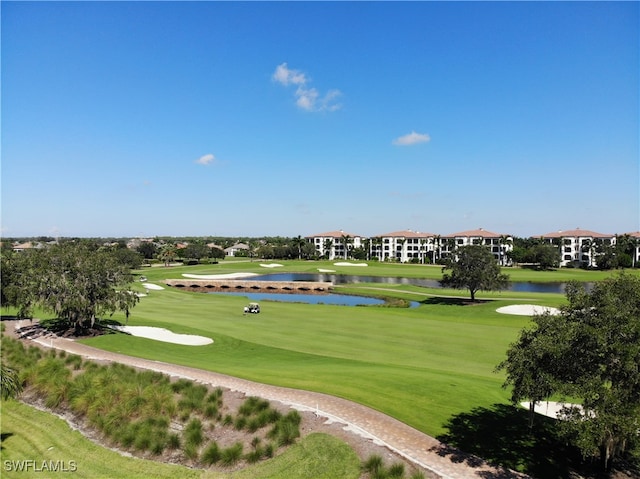 view of home's community with a water view