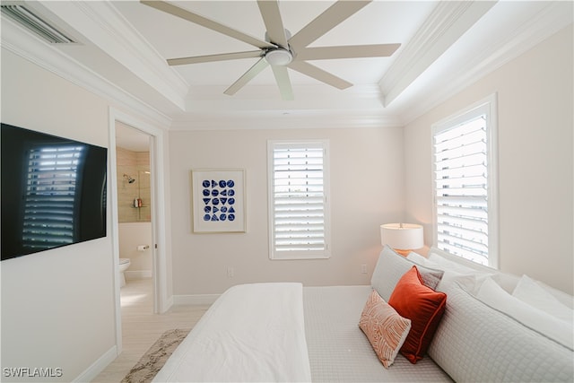 bedroom with connected bathroom, light hardwood / wood-style flooring, ceiling fan, and ornamental molding