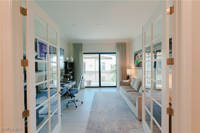 office with crown molding and french doors