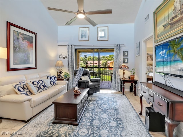 tiled living room featuring ceiling fan