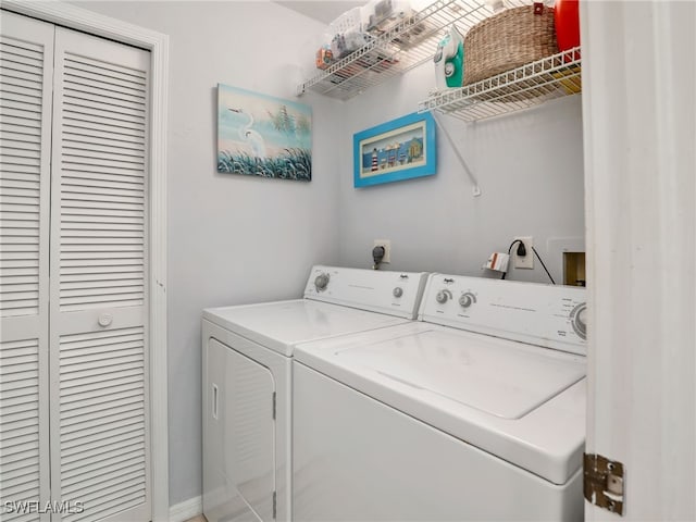 laundry room featuring washer and clothes dryer