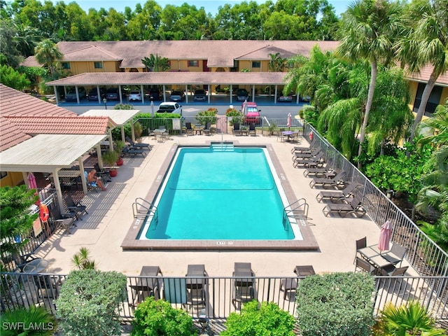 view of swimming pool featuring a patio