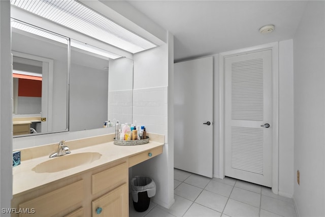 bathroom with vanity and tile patterned floors