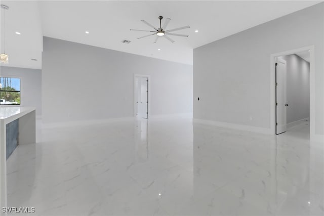 unfurnished room with ceiling fan