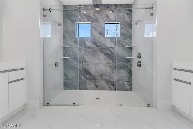 bathroom featuring vanity and an enclosed shower