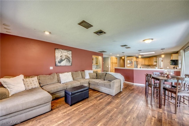 living room with hardwood / wood-style floors