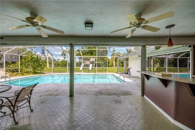 view of swimming pool with ceiling fan