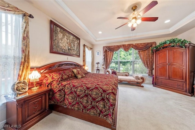 bedroom with ornamental molding, access to outside, carpet flooring, and a raised ceiling