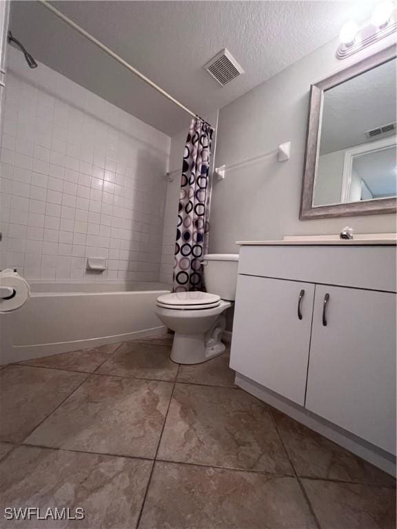 full bathroom featuring a textured ceiling, shower / tub combo, vanity, and toilet