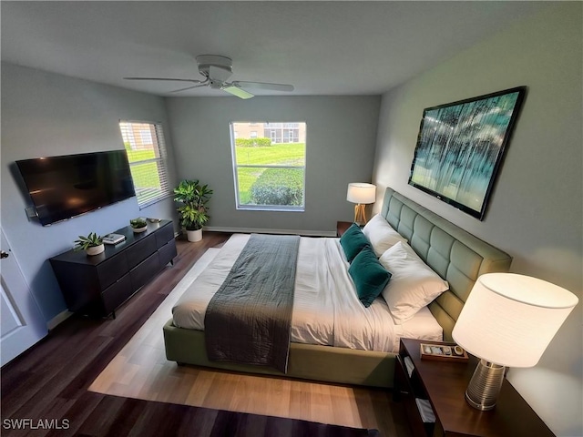 bedroom featuring ceiling fan and wood-type flooring