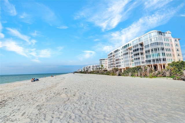 property view of water featuring a beach view