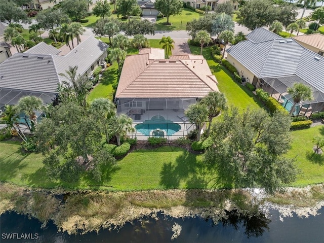 birds eye view of property featuring a water view