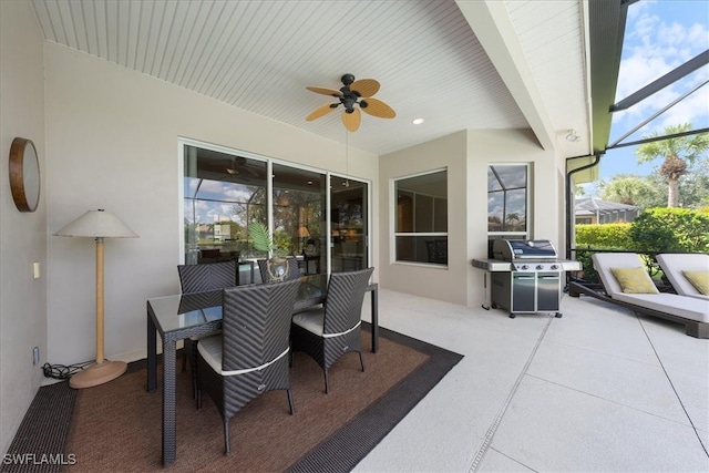 exterior space featuring ceiling fan