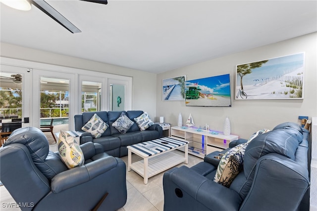 tiled living room with ceiling fan