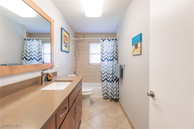 full bathroom featuring toilet, shower / bath combo, vanity, and tile patterned floors