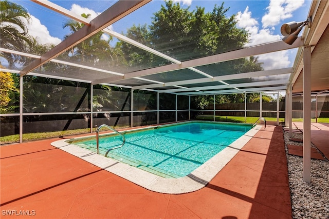 view of pool featuring a lanai and a patio