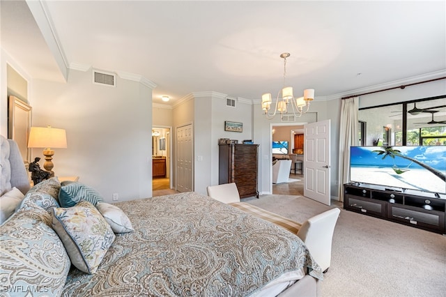 carpeted bedroom with a notable chandelier and crown molding