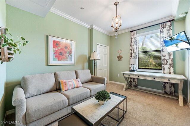 living room featuring ornamental molding, a chandelier, and light colored carpet