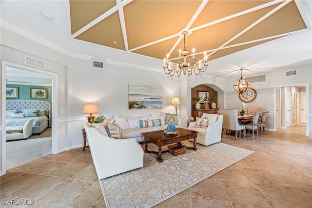 living room featuring crown molding and a notable chandelier