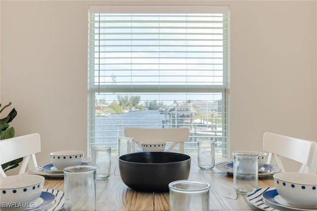 dining area with hardwood / wood-style flooring