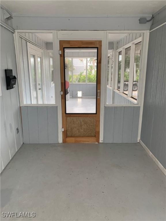 entryway with concrete floors