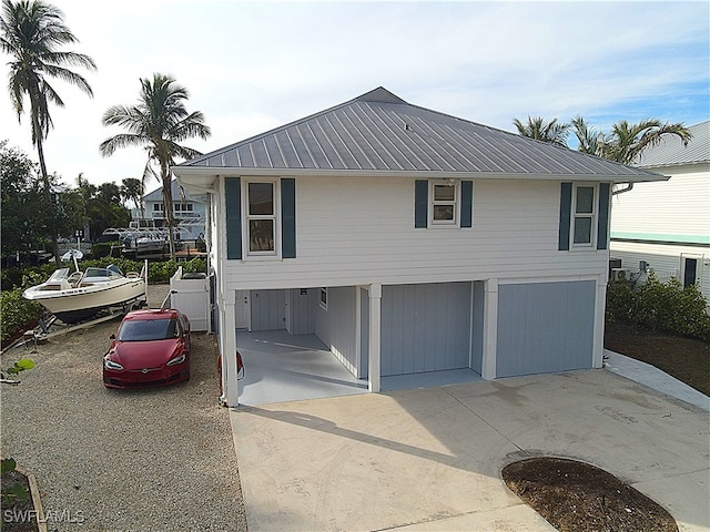 view of property exterior with a carport