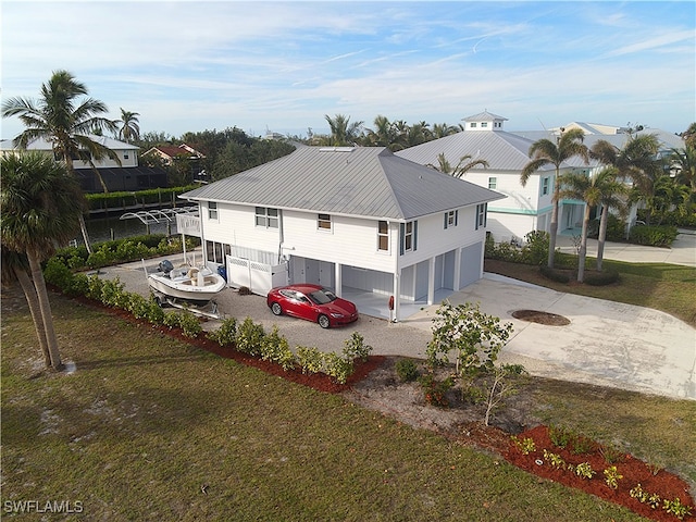 view of home's exterior featuring a yard and a garage