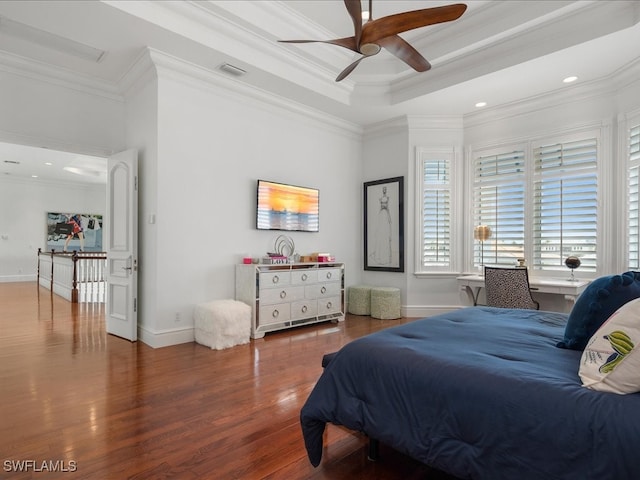 bedroom with ceiling fan, crown molding, and wood-type flooring