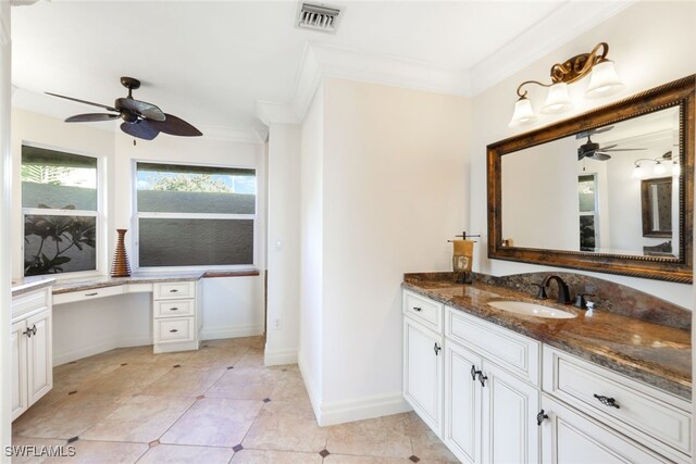 bathroom with ornamental molding, vanity, ceiling fan, and tile patterned floors