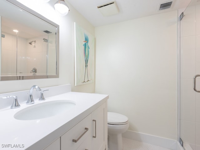 bathroom featuring walk in shower, tile patterned floors, vanity, and toilet