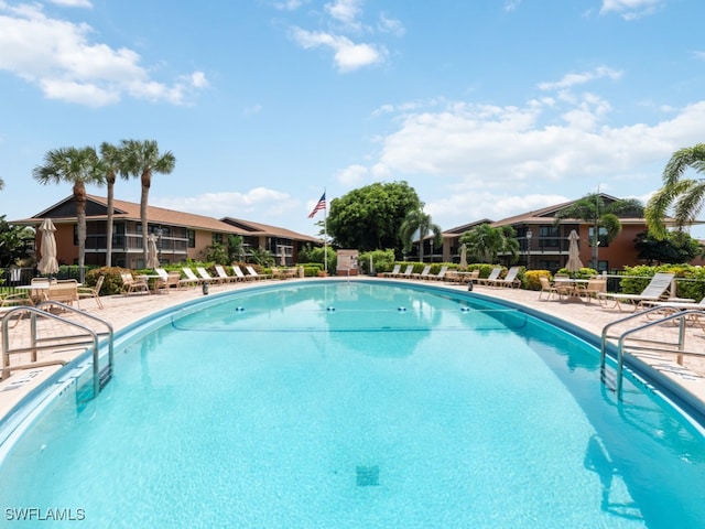 view of swimming pool with a patio