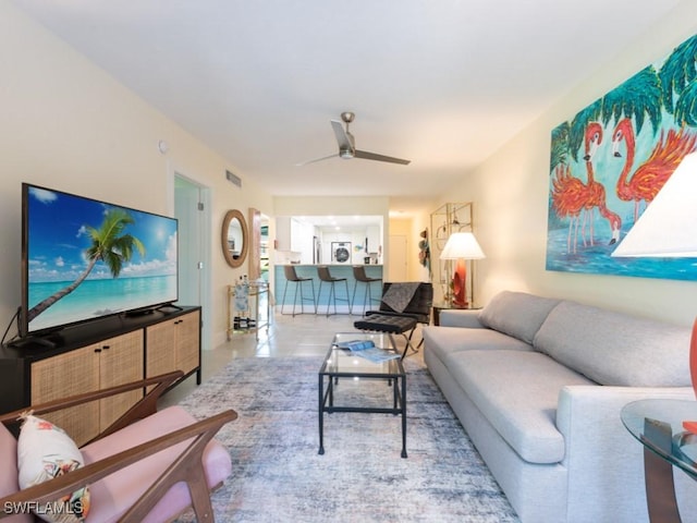 living room with ceiling fan