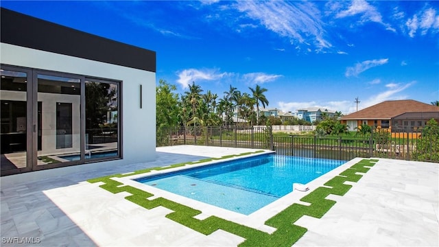 view of pool featuring a patio area