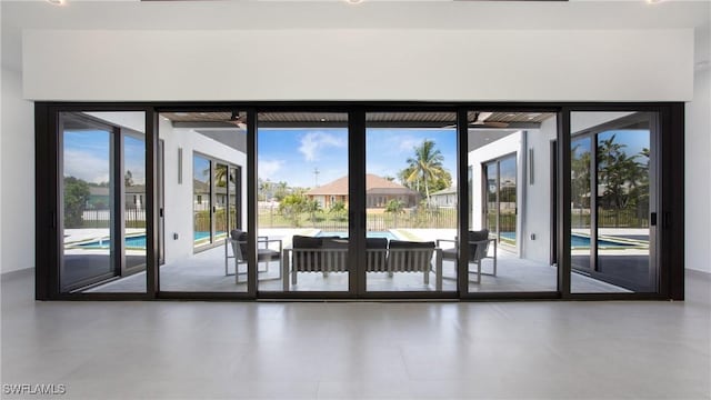 doorway to outside featuring a wealth of natural light