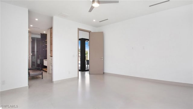 empty room featuring ceiling fan