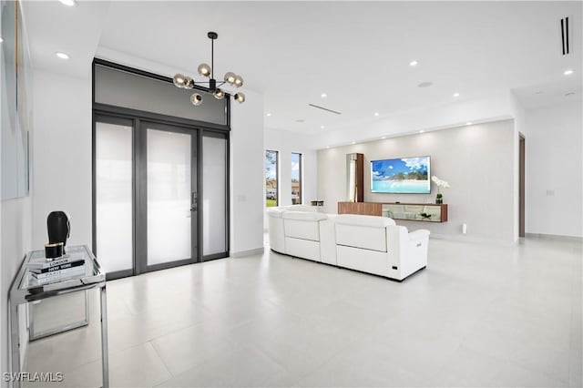 living room featuring a chandelier