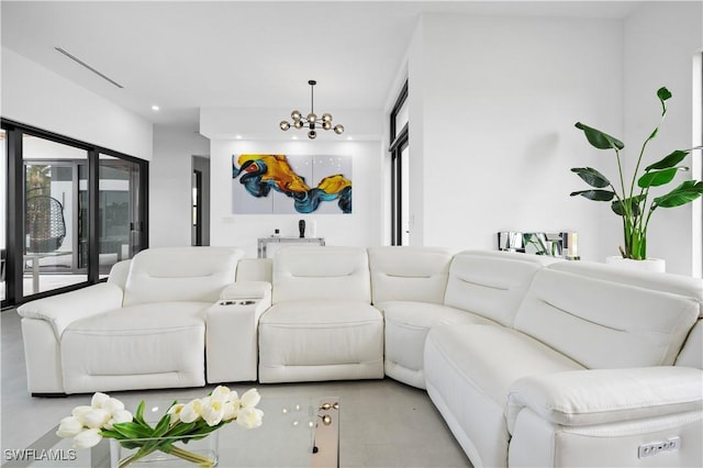 living room featuring a chandelier