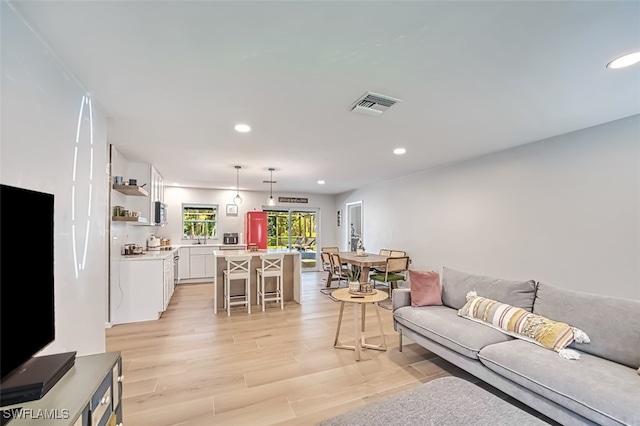 living room featuring light hardwood / wood-style flooring