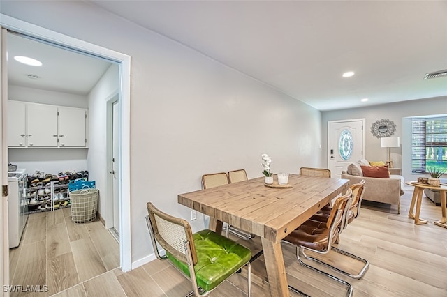 dining space featuring light hardwood / wood-style flooring