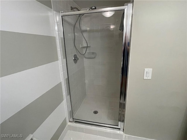 full bathroom with a stall shower