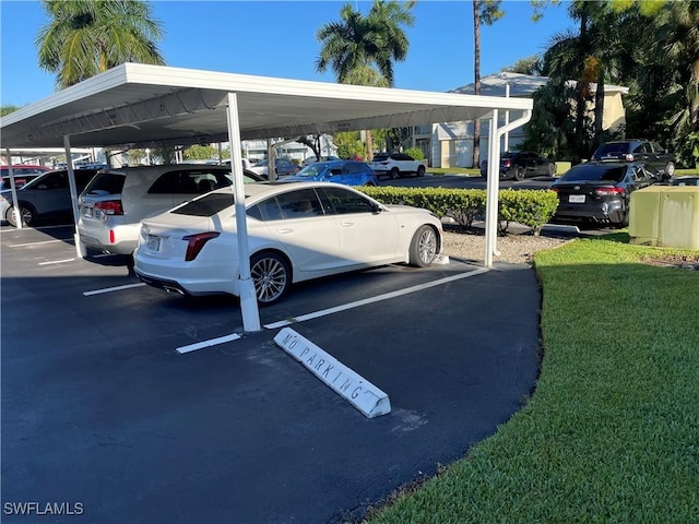 view of partially covered parking lot