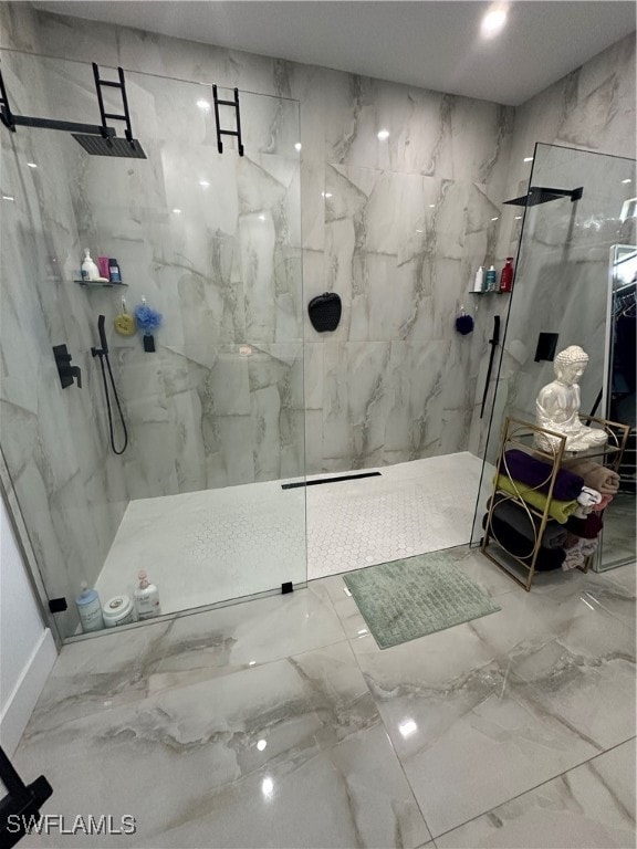 bathroom with a tile shower