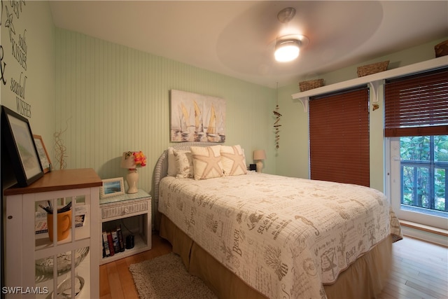 bedroom featuring wood-type flooring and ceiling fan