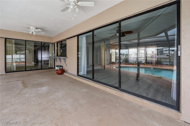 exterior space with ceiling fan and lofted ceiling