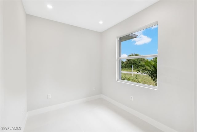 1155 Ermine St E, Lehigh Acres, FL 33974 - spare room featuring recessed lighting