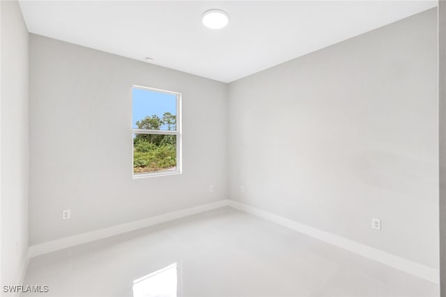 1155 Ermine St E, Lehigh Acres, FL 33974 - empty room featuring baseboards