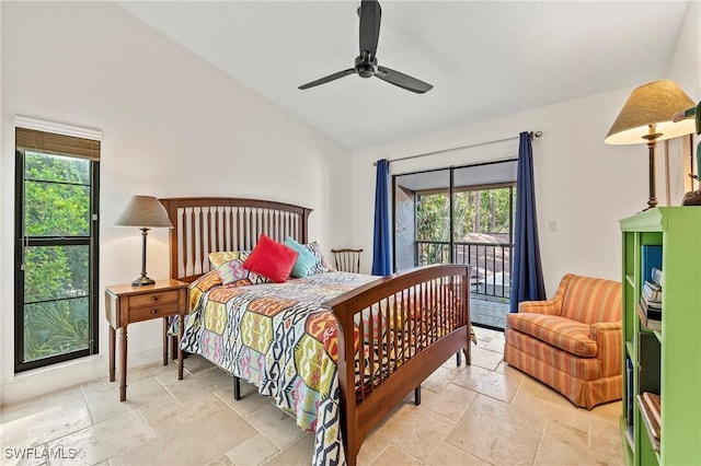 bedroom with ceiling fan, access to outside, and vaulted ceiling