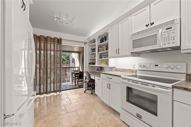 kitchen with white cabinetry and white appliances