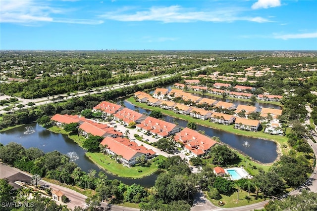 drone / aerial view with a water view